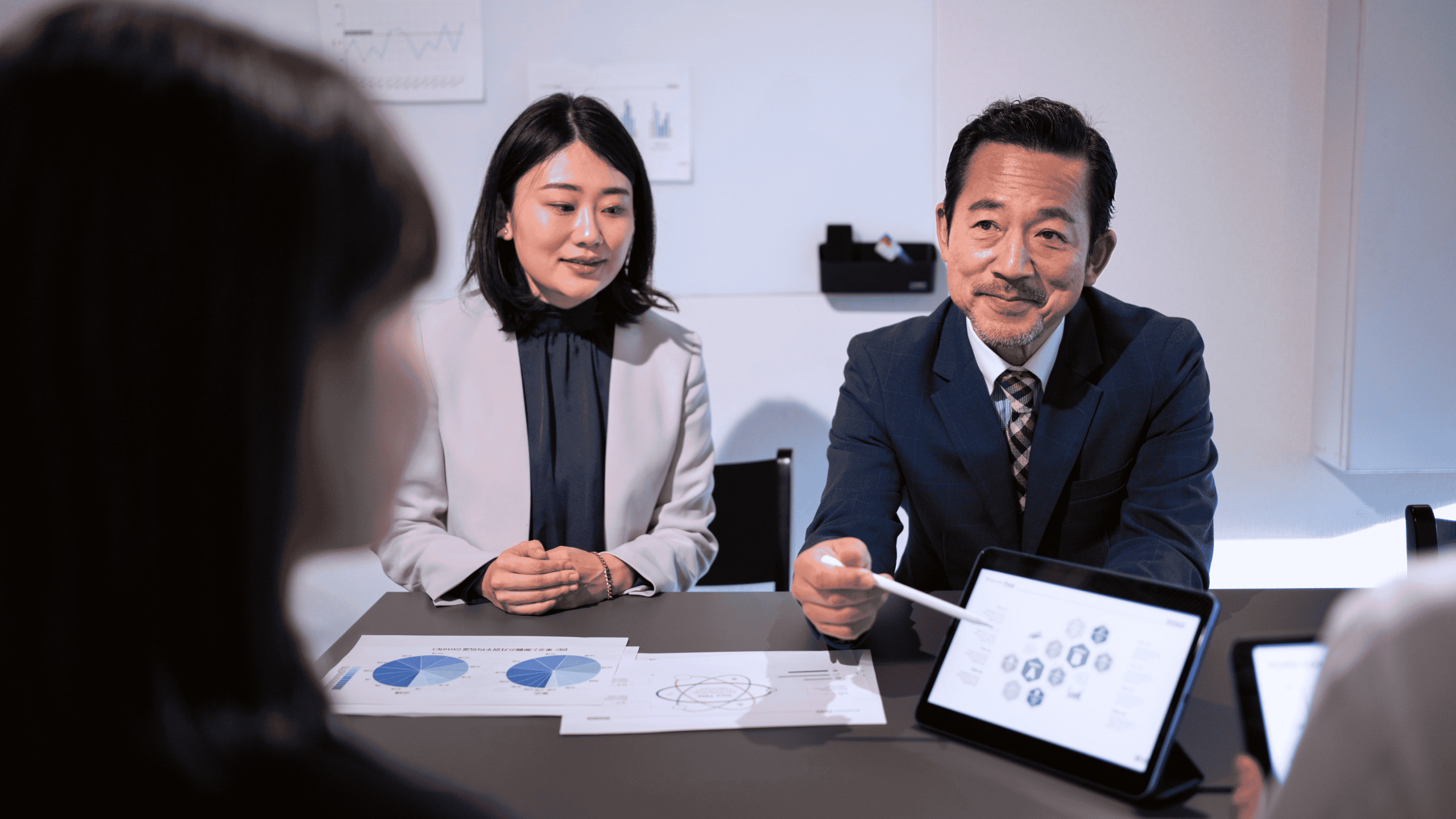 Business leaders discussing strategy during a meeting
